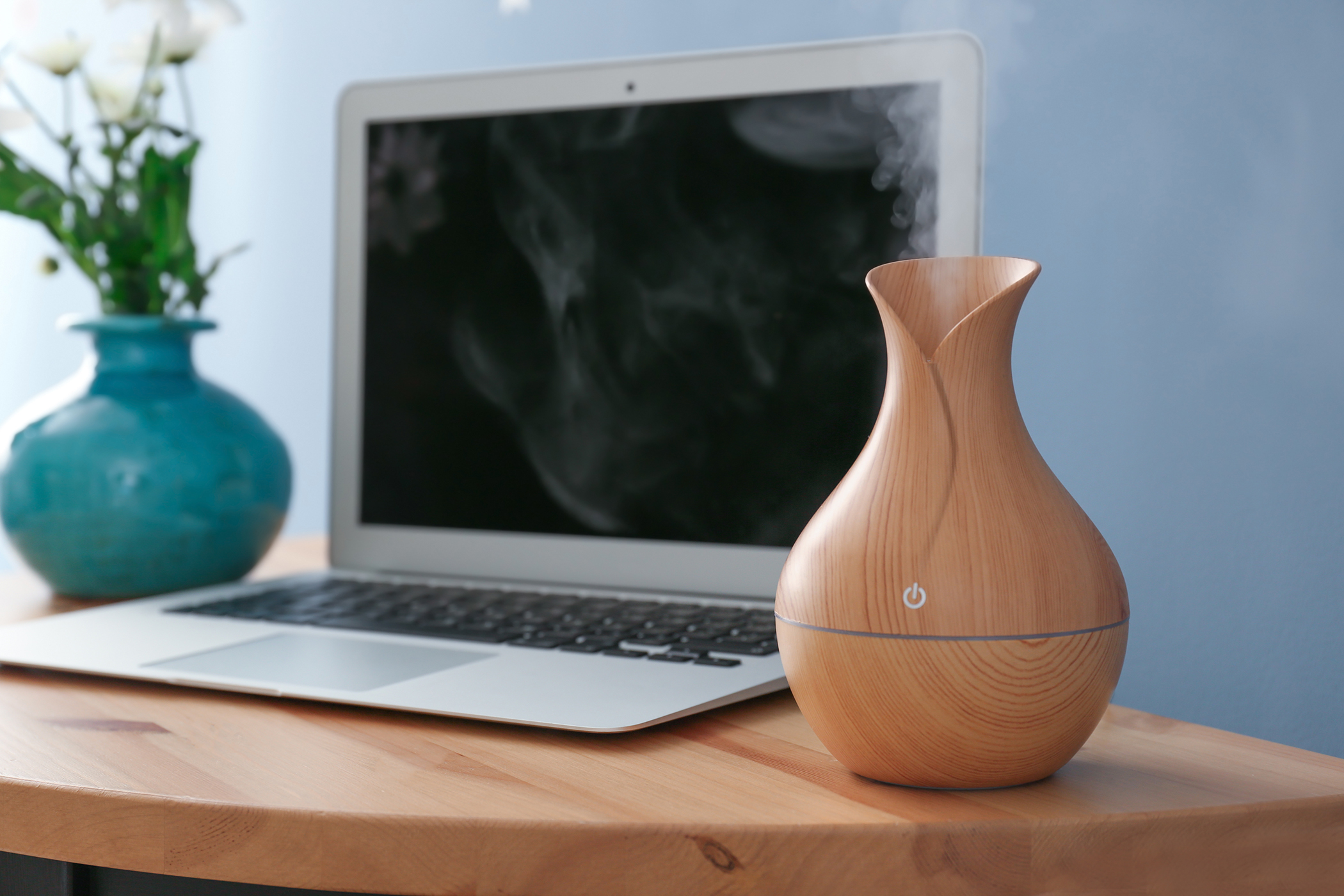 Aromatherapy essential oil diffuser in office working from home